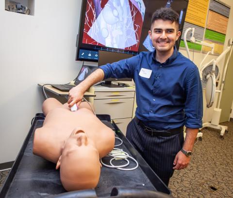 Student learns to use ultrasound