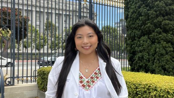 Medical student in white coat