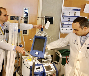 physicians with medical equipment