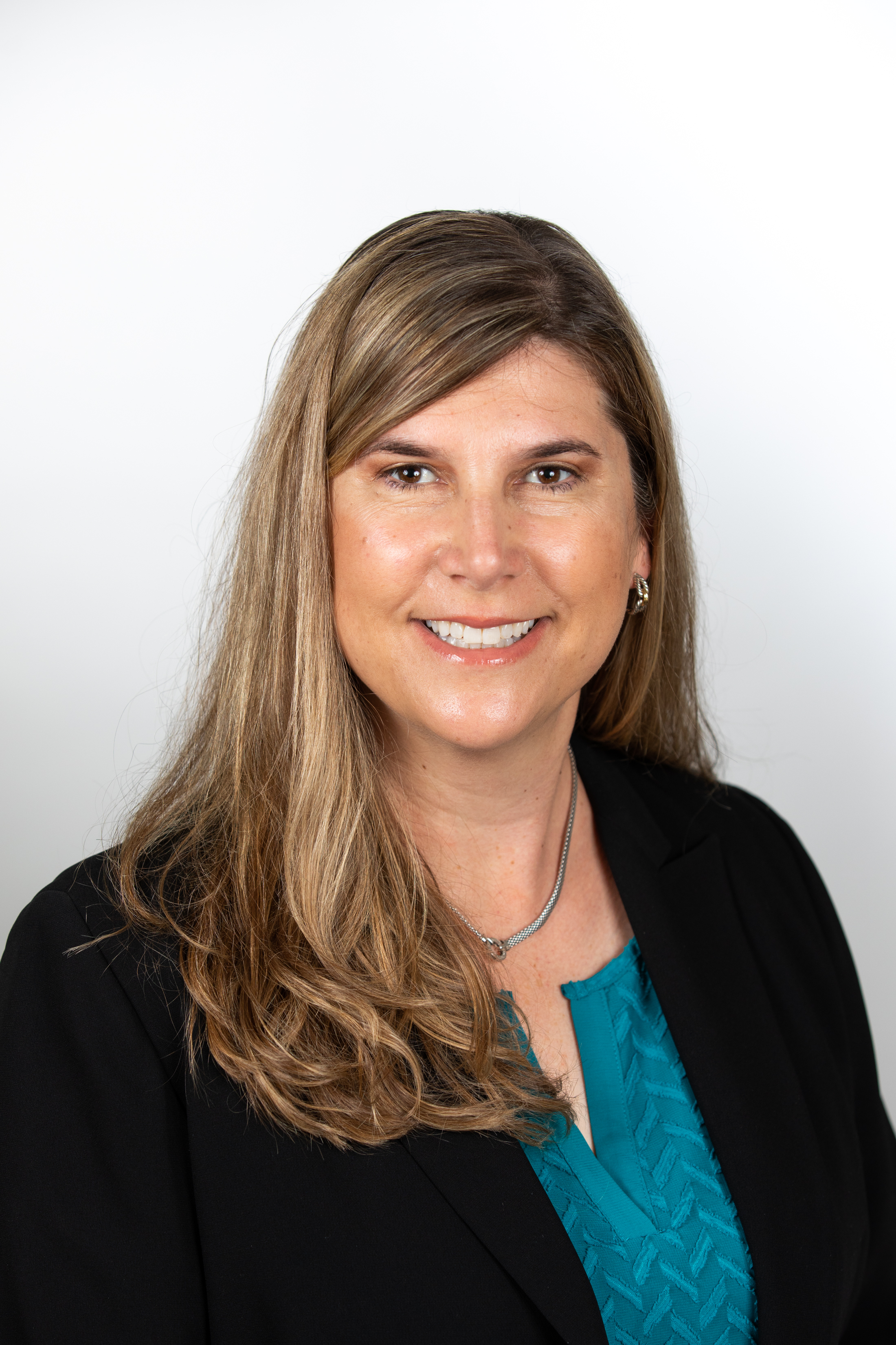 Professional headshot photo of Dr. Danielle Campagne